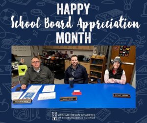 Web Graphic for School Board Appreciation Month at West Michigan Academy of Environmental Science posing for a picture at a desk together.